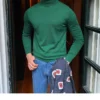 Burgundy wool turtleneck sweater for winter
